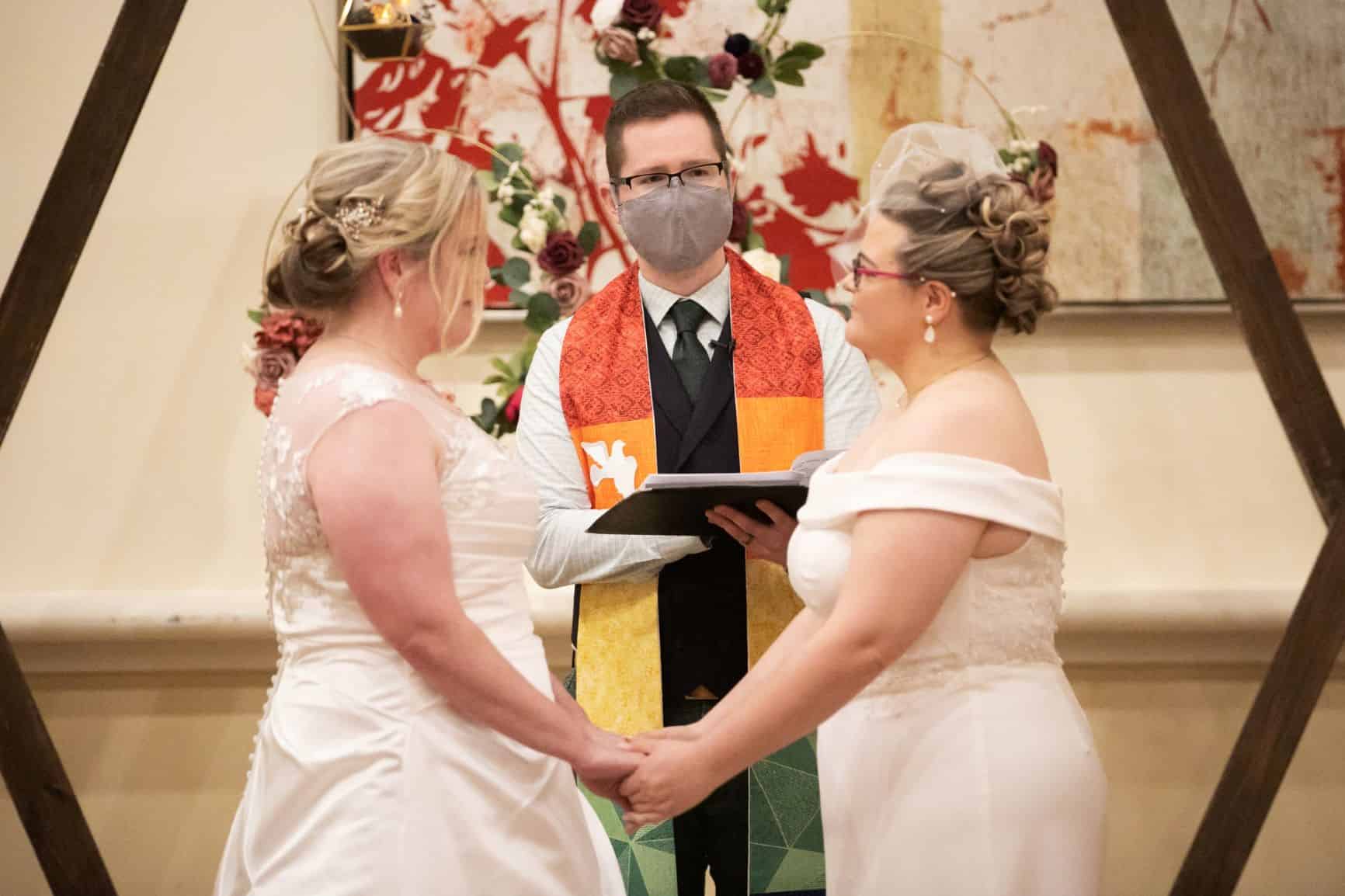 Rainy Day Wedding - Just Marry Weddings - Roots Photography - Brides Exchanging Vows
