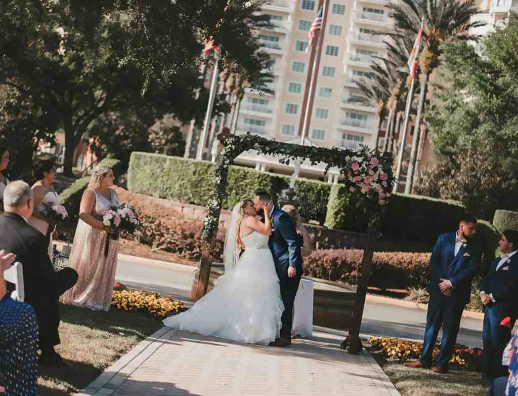 Blush and Blue Wedding - Just Marry Weddings - Brittany Wolford Photography - First Kiss