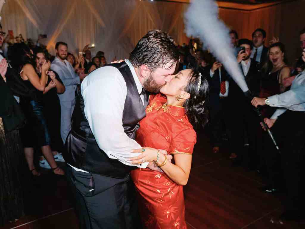 Bride and groom kissing