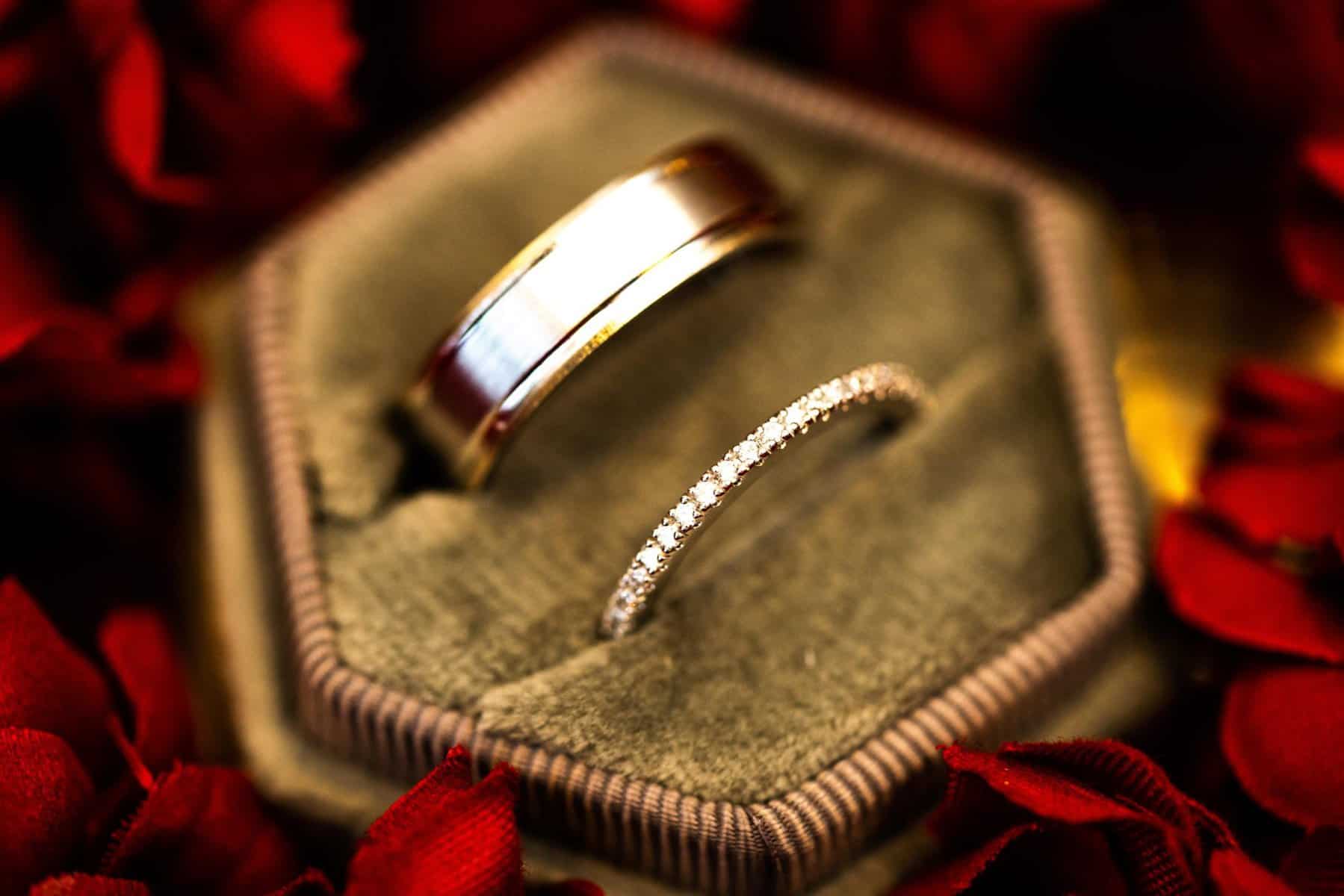 Wedding rings in a moss green velvet lined box