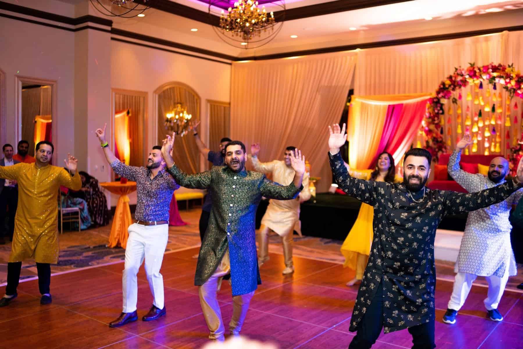 Indian wedding mehendi and sangeet dancing