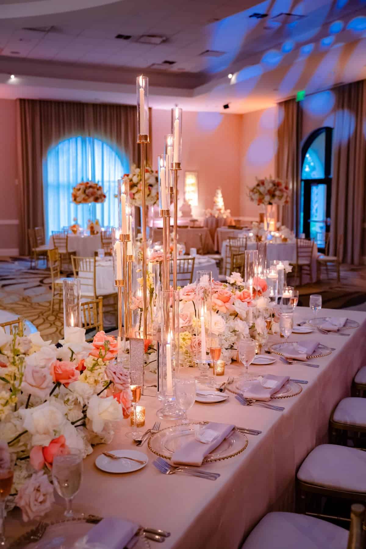 Blush, orange, and gold wedding reception