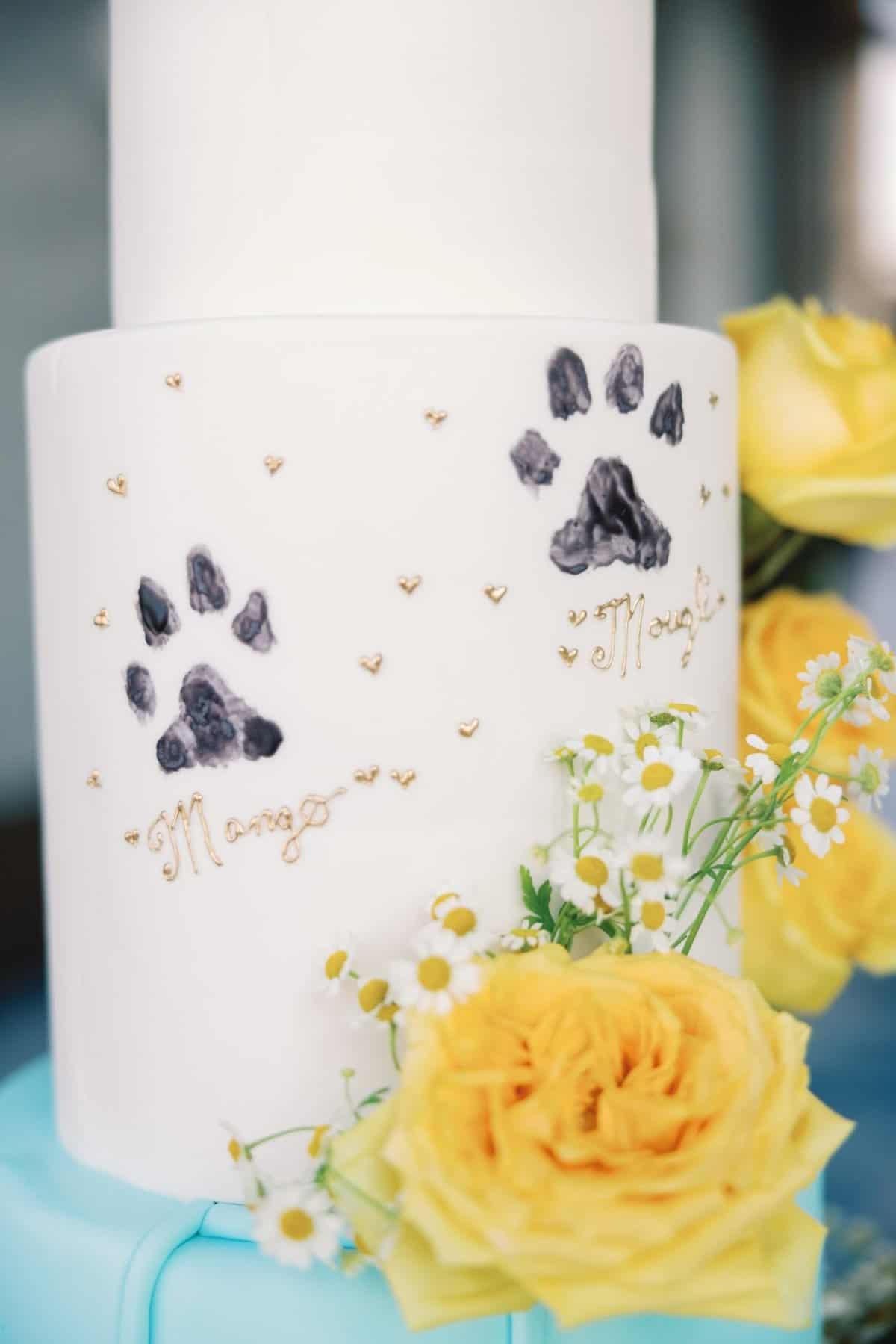 Dog paw prints on a wedding cake