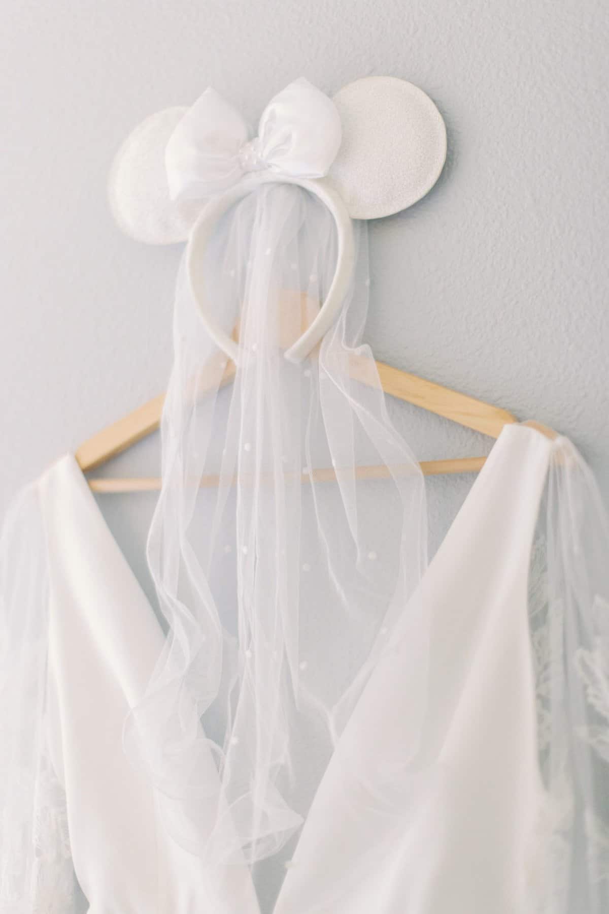 Bride's wedding dress and Minnie ears for a Disney wedding