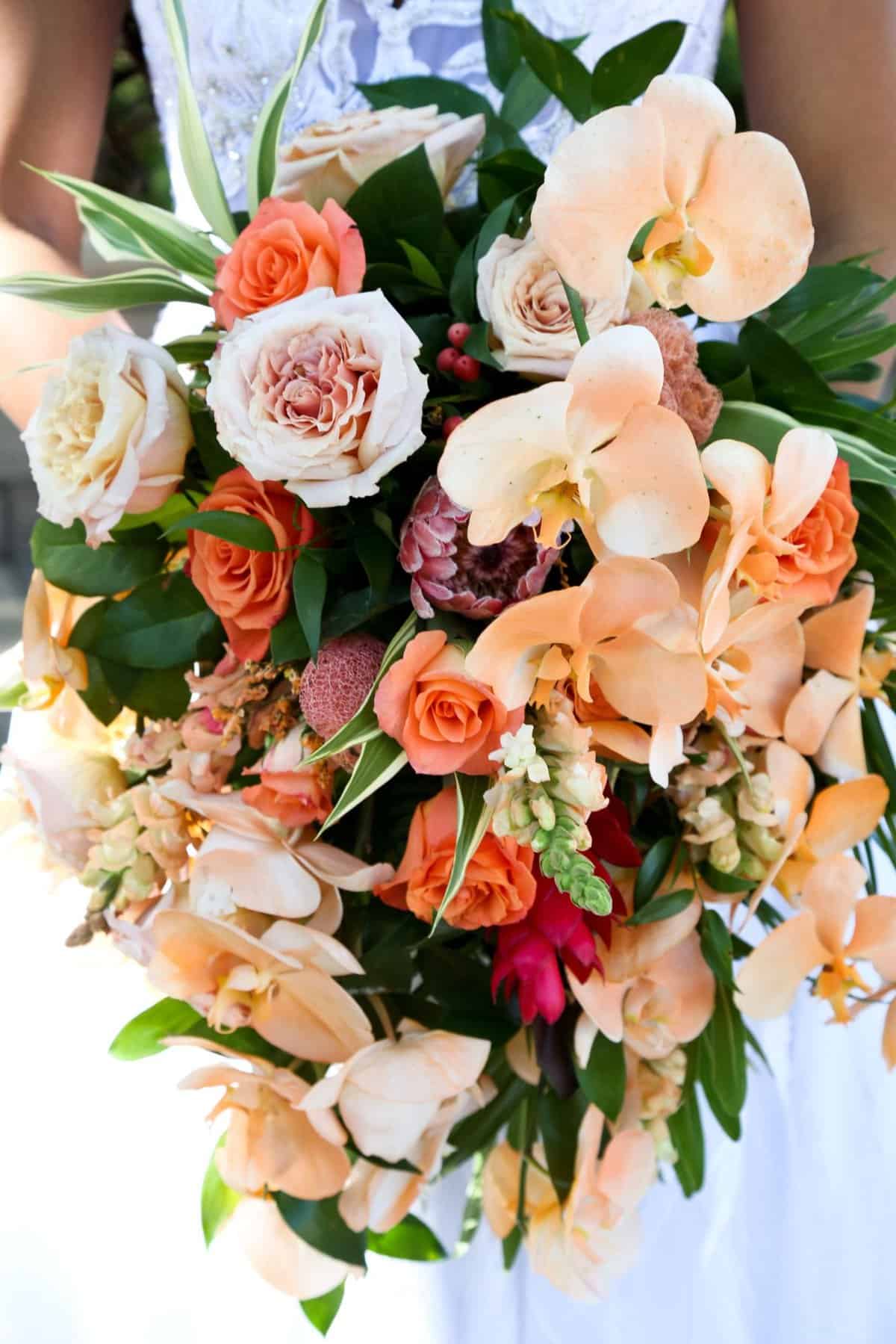 Tropical cascading orange and peach bridal bouquet