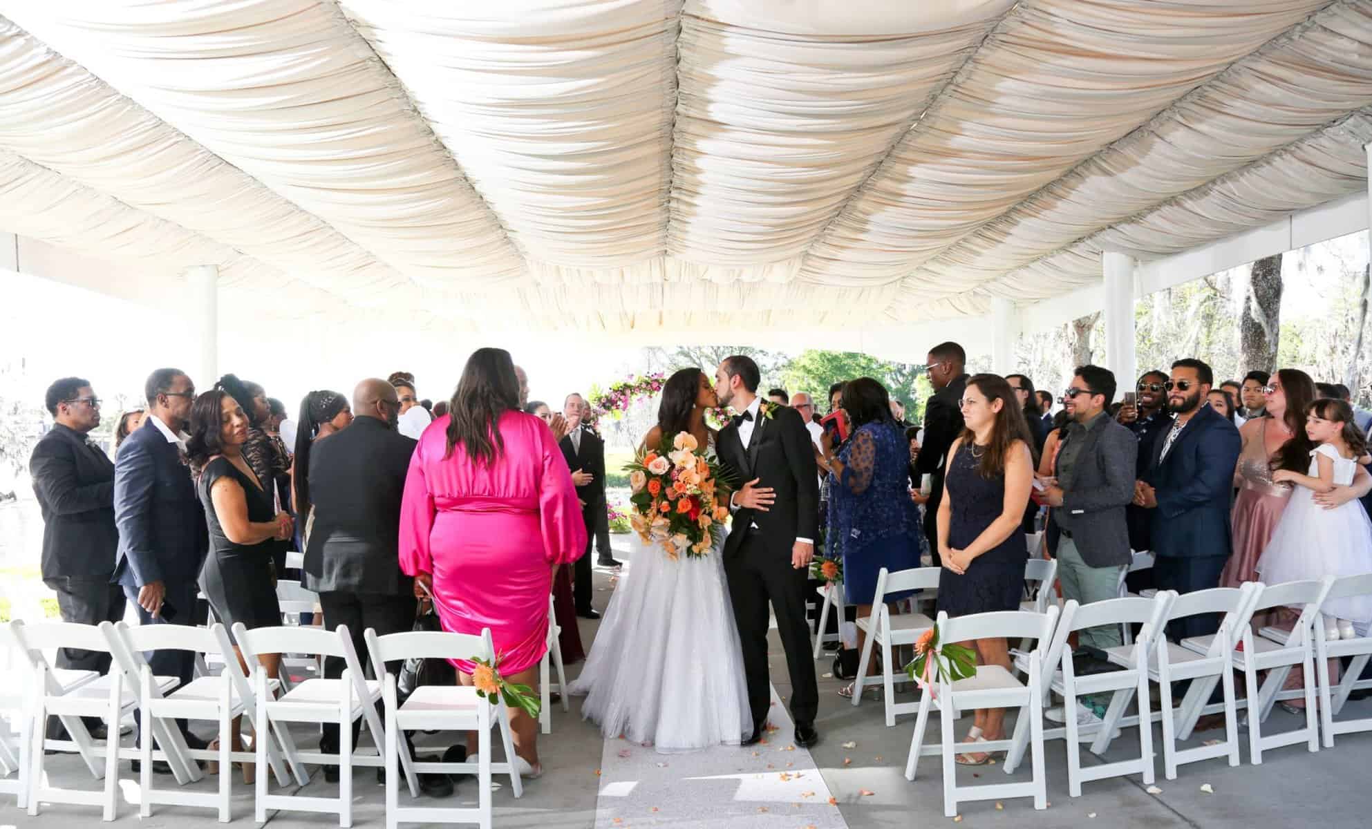 Bride and groom kiss after the ceremony