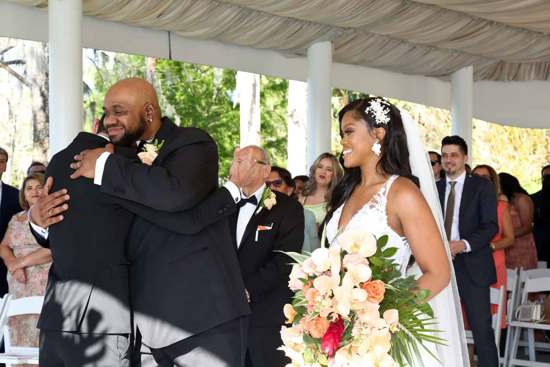 Bride being given away at the wedding ceremony