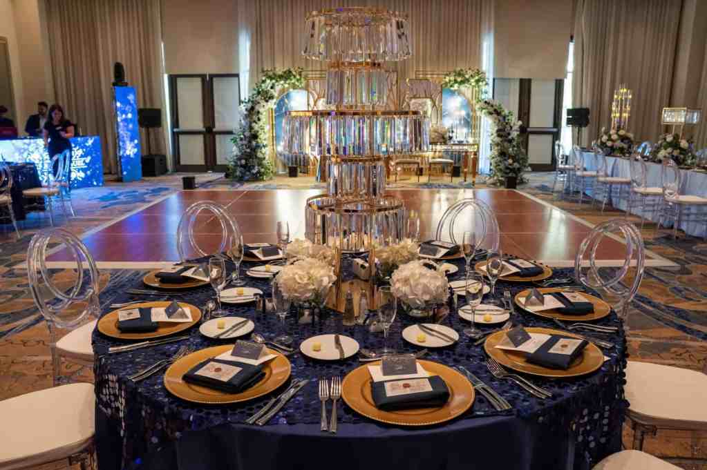 Blue and gold wedding reception at Wyndham Grand Orlando Resort Bonnet Creek