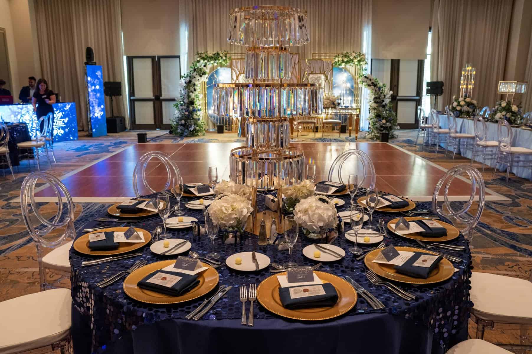 Blue and gold wedding reception at Wyndham Grand Orlando Resort Bonnet Creek