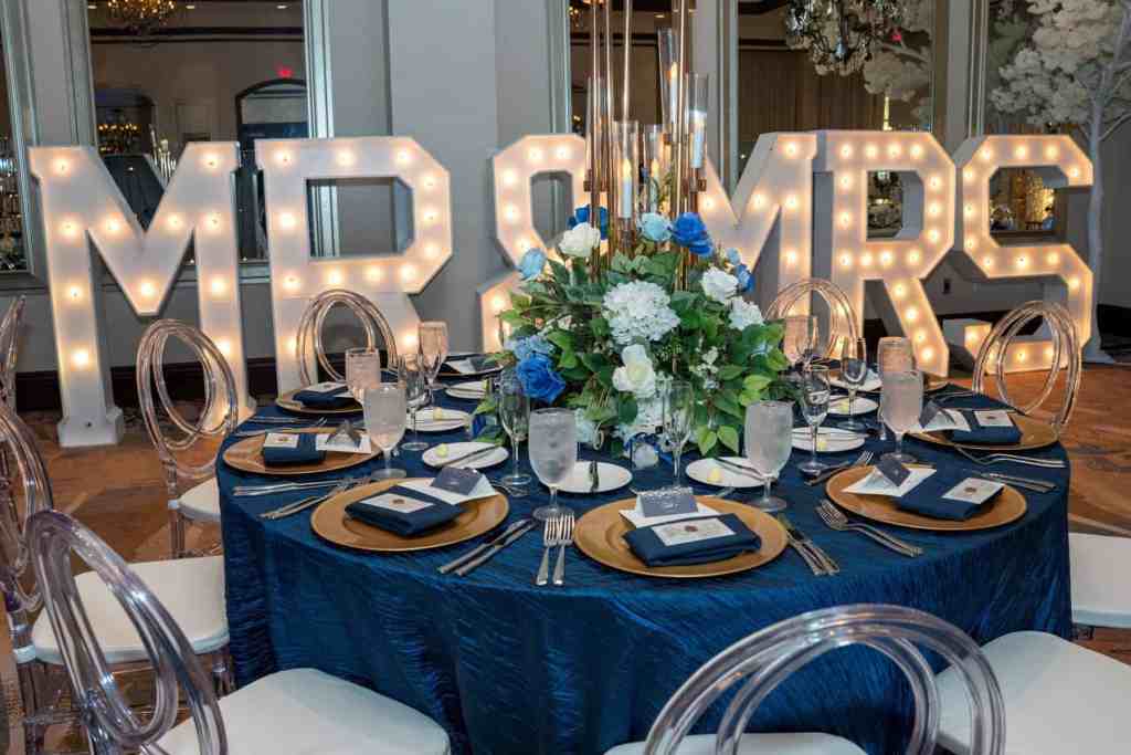 Blue and gold wedding reception at Wyndham Grand Orlando Resort Bonnet Creek