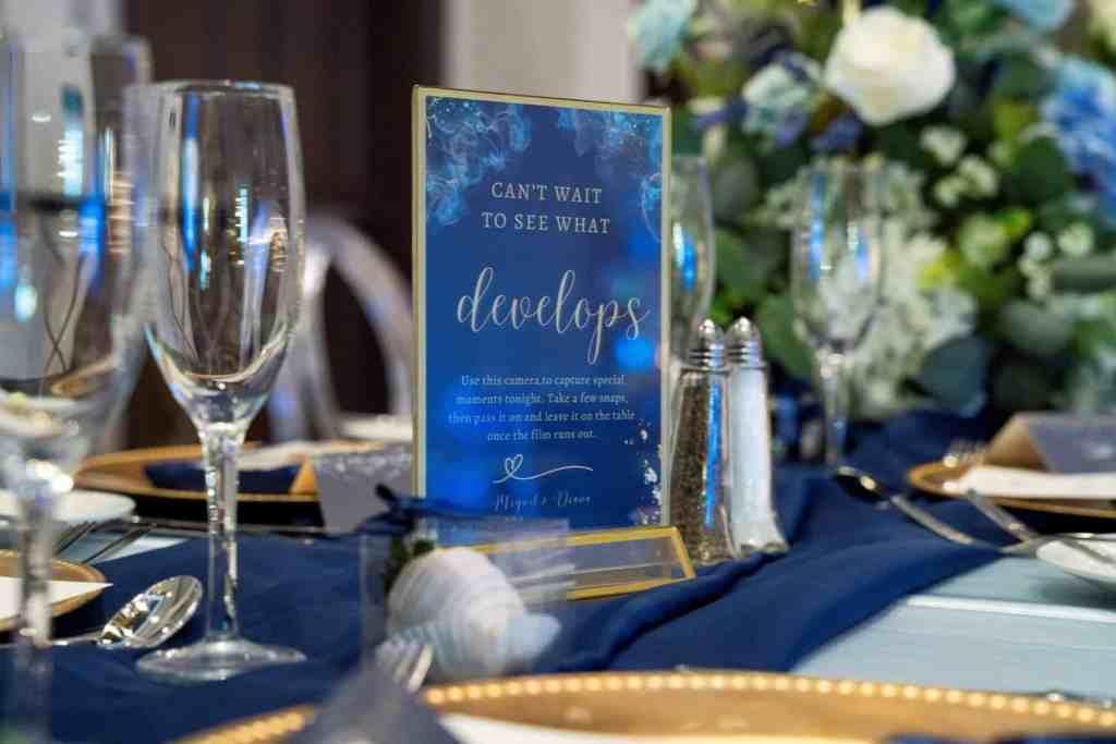 Blue and gold wedding reception at Wyndham Grand Orlando Resort Bonnet Creek