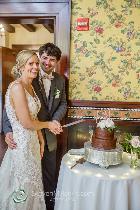 Cake cutting at a wedding reception at Mama Della's