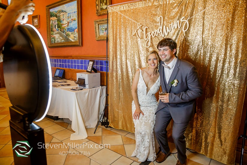 Bride and groom posing in their photo booth
