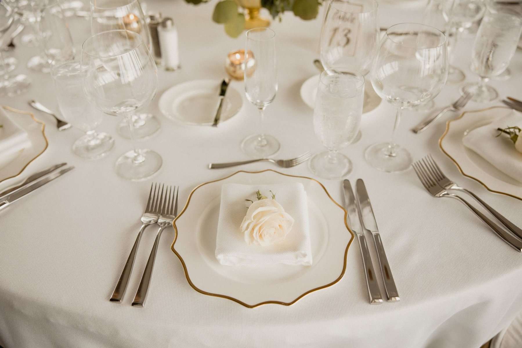 White and gold wedding reception decor