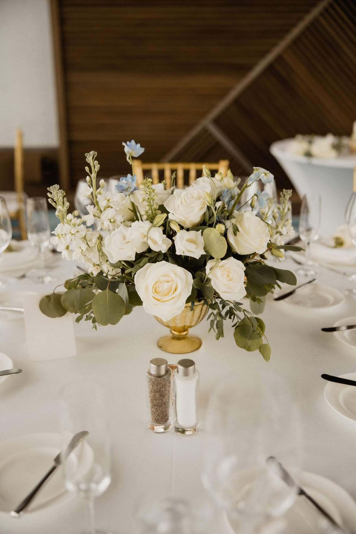 White and gold wedding reception decor