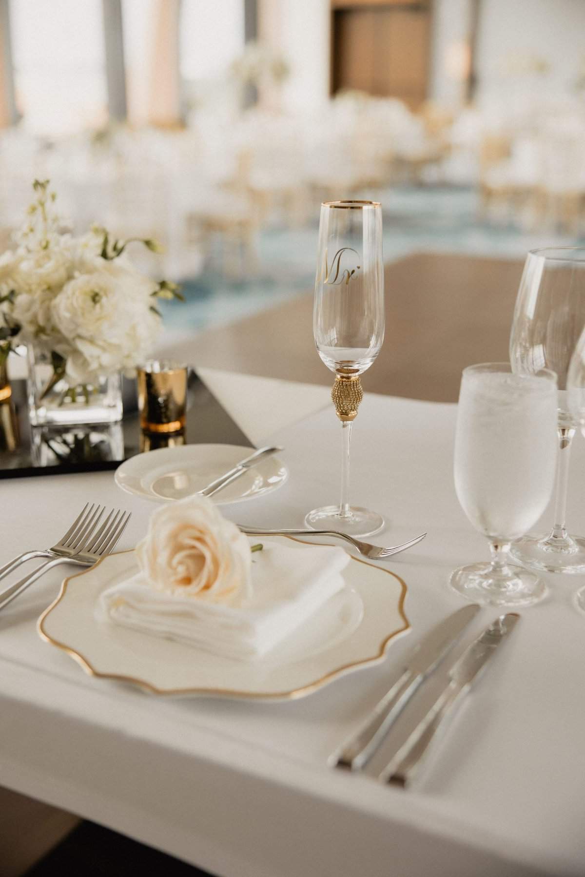 White and gold wedding reception decor