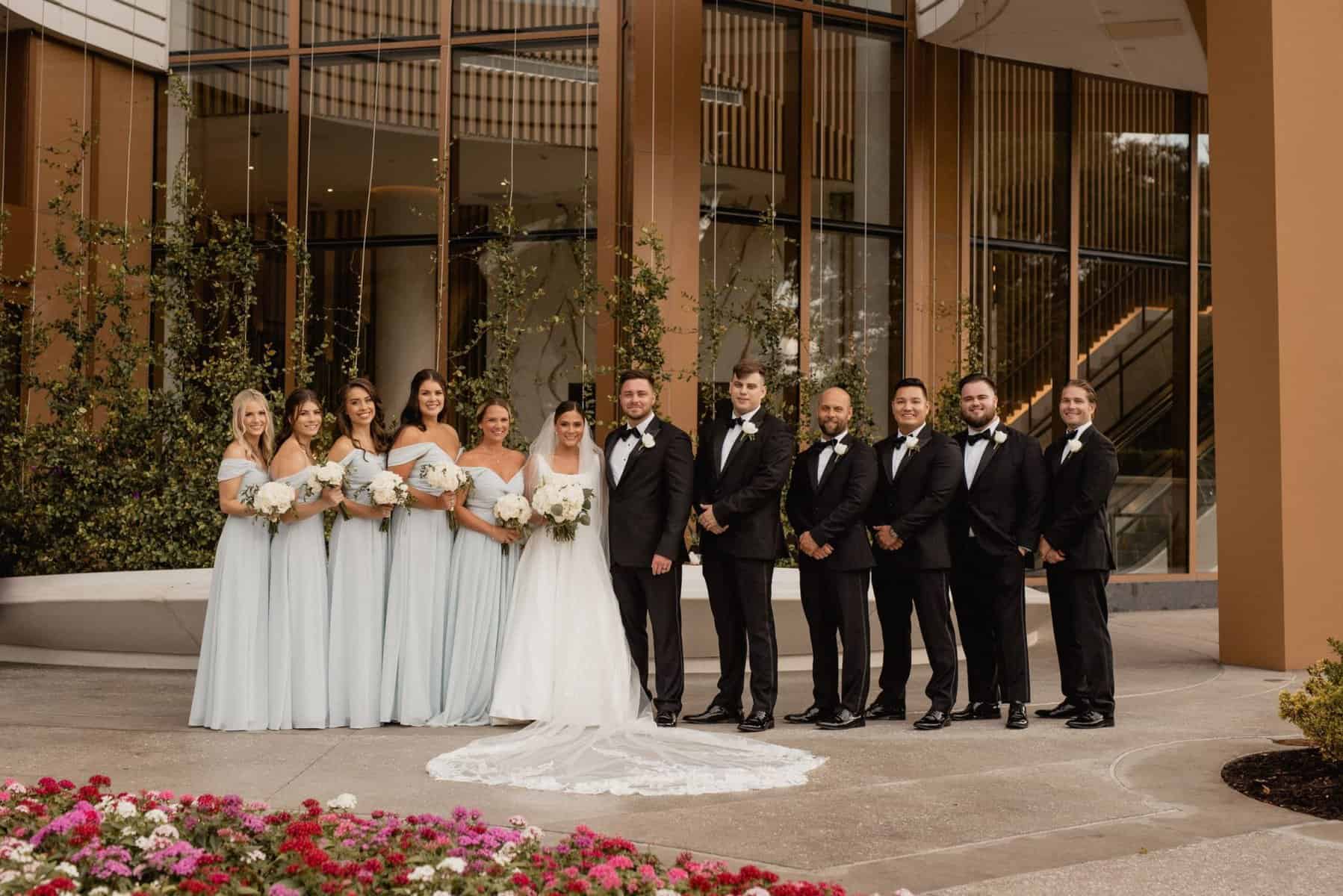 Bride and groom portraits with their wedding party