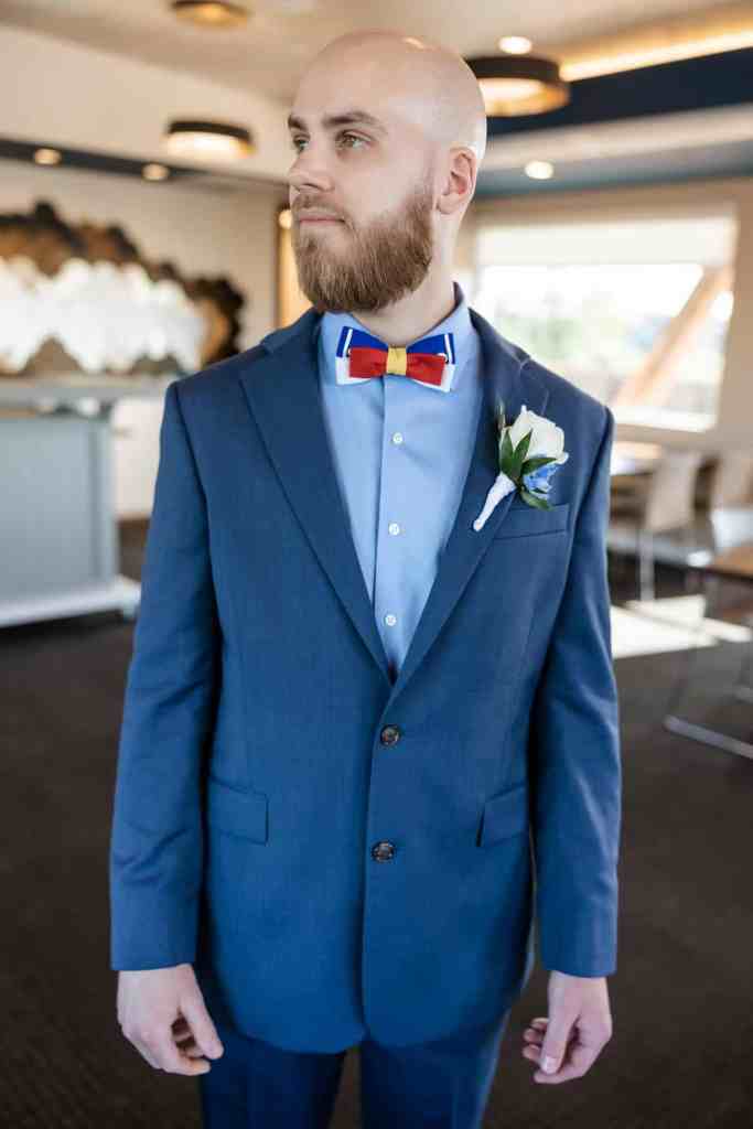 Groom getting ready before his Paddlefish wedding