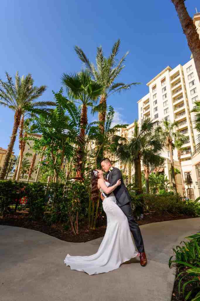 Bride and groom portraits around the Wyndham Grand Orlando Resort Bonnet Creek