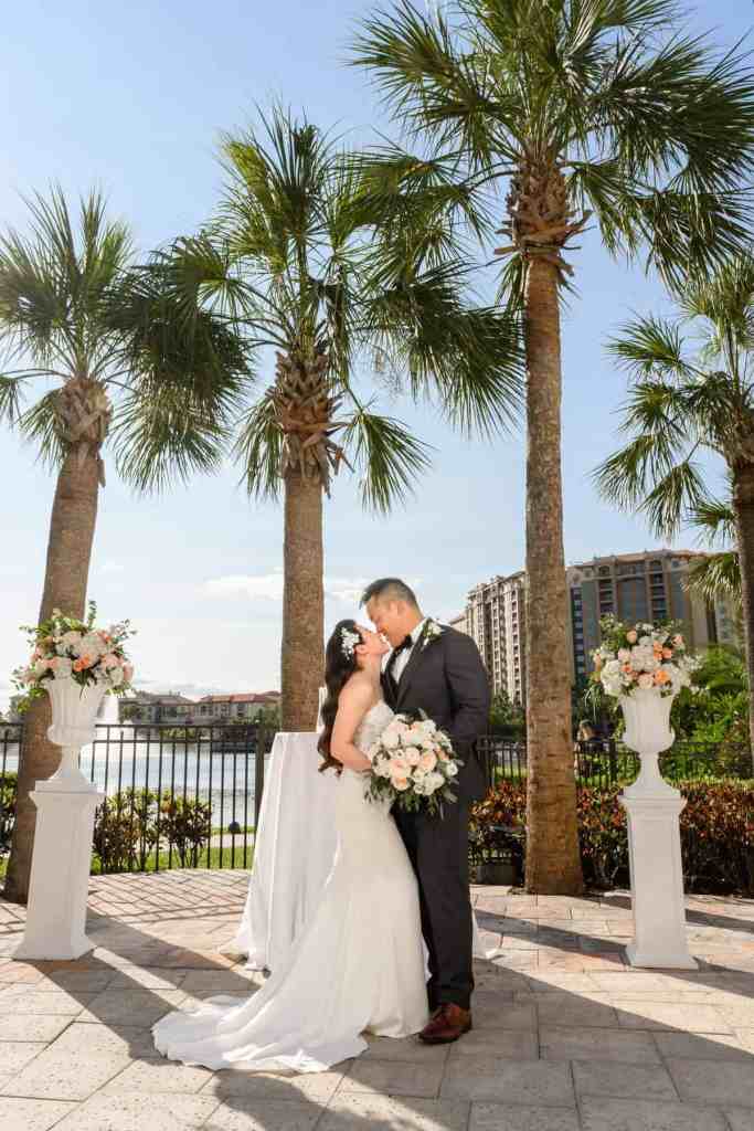 Bride and groom portraits around the Wyndham Grand Orlando Resort Bonnet Creek