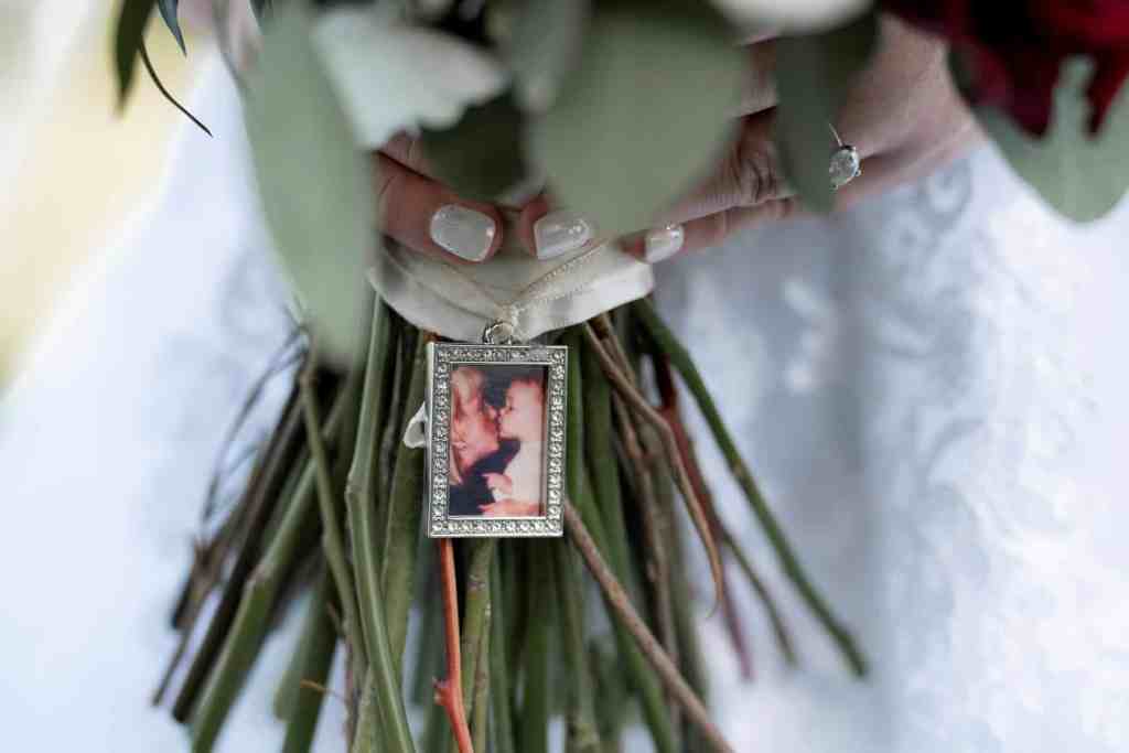 Memento pin in bride's bouquet