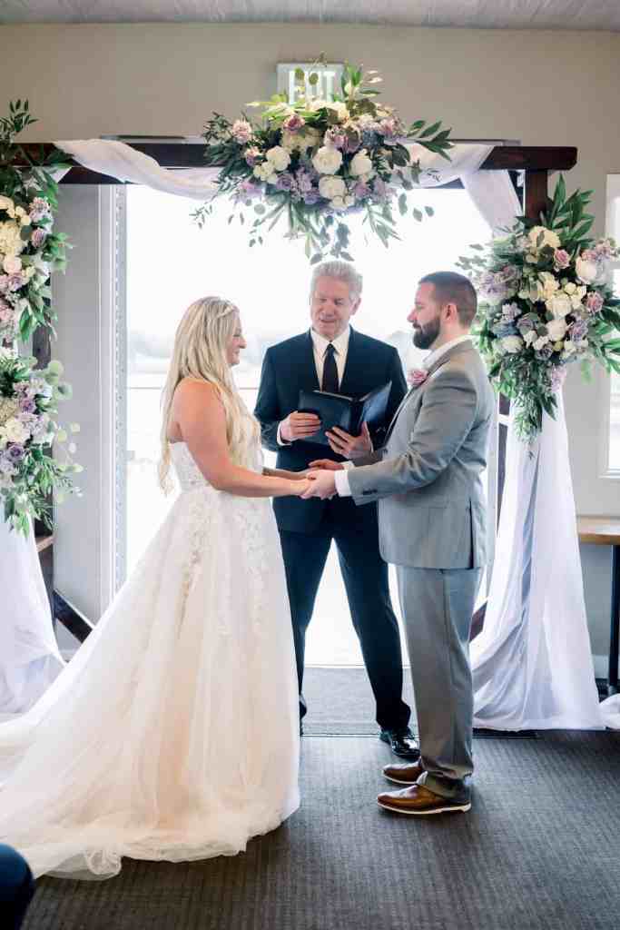 Indoor wedding ceremony at Paddlefish Disney Springs