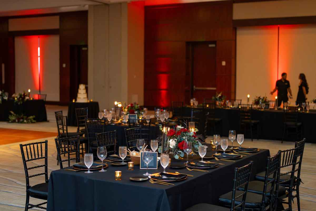 Black, red, and gold wedding reception at Marriott Harbor Beach Resort & Spa
