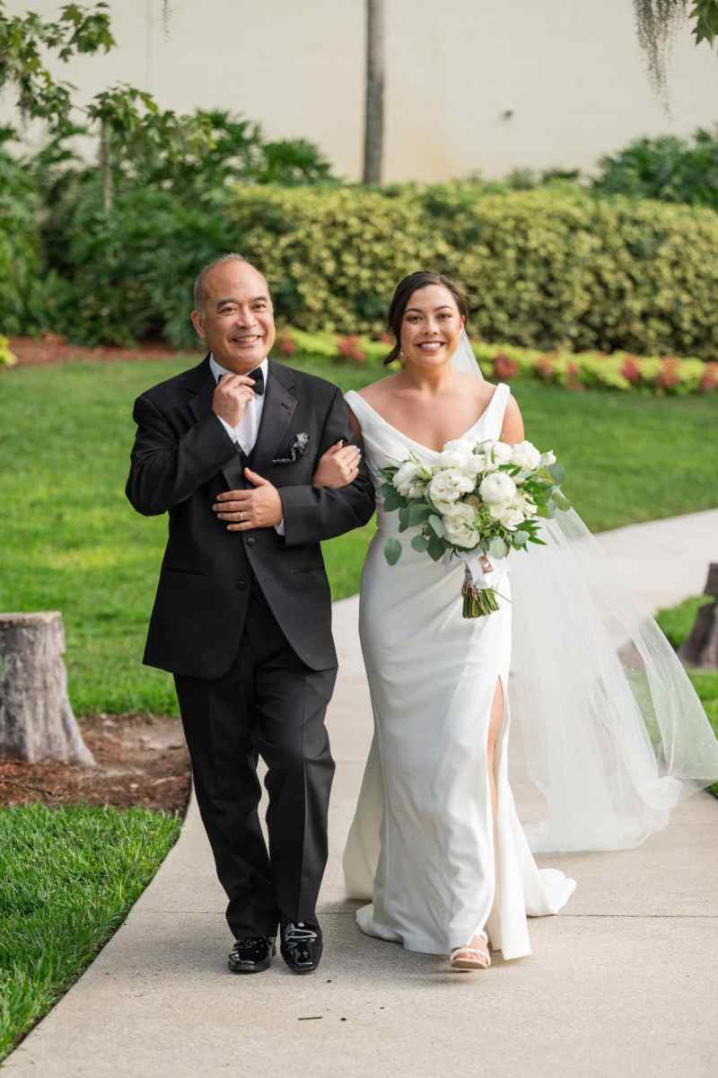 Bride processing up the aisle at Hyatt Regency Grand Cypress