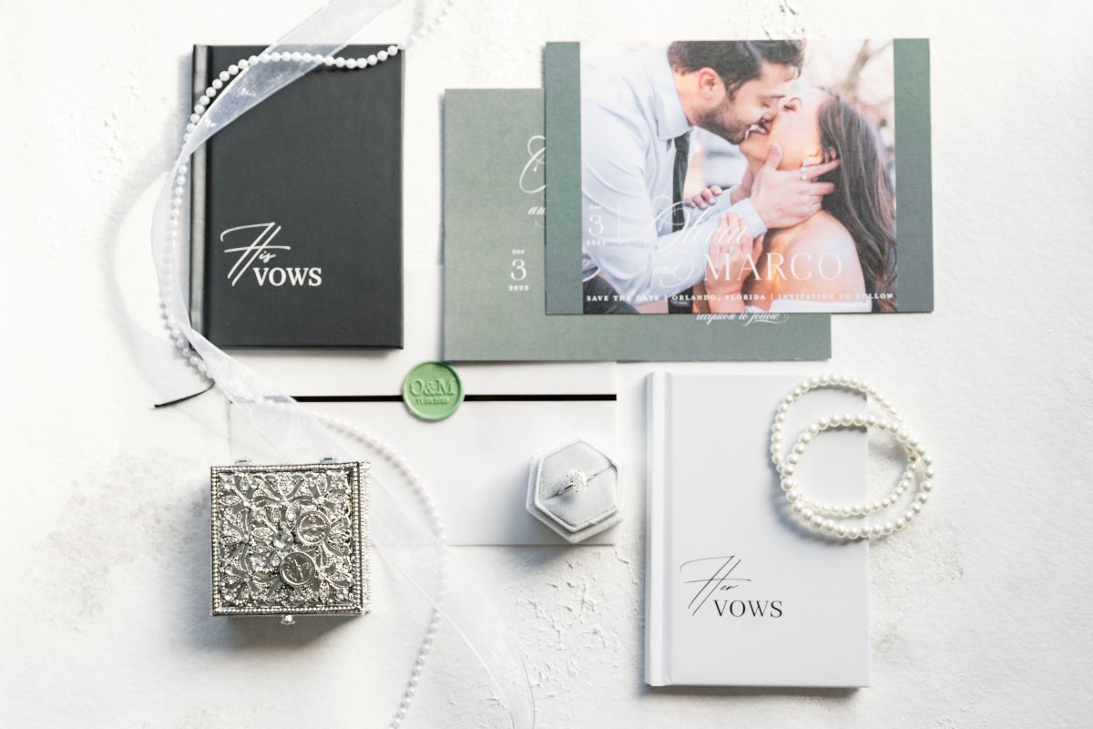 Green and white stationery flat lay