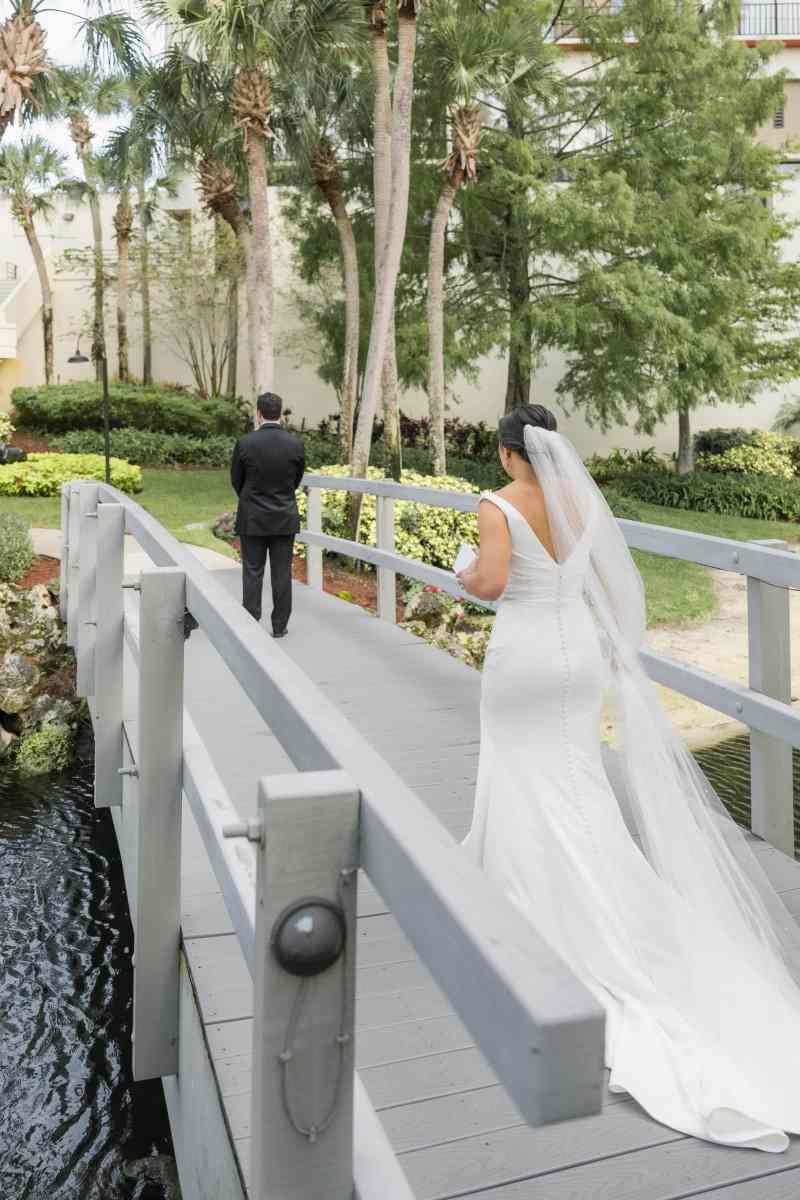Bride and groom's first look at the Hyatt Regency Grand Cypress