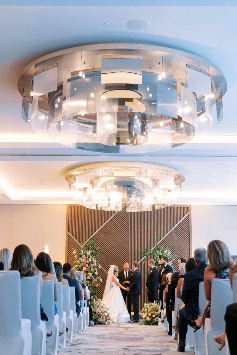 Wedding ceremony in the Oasis Ballroom at the WDW Swan Reserve