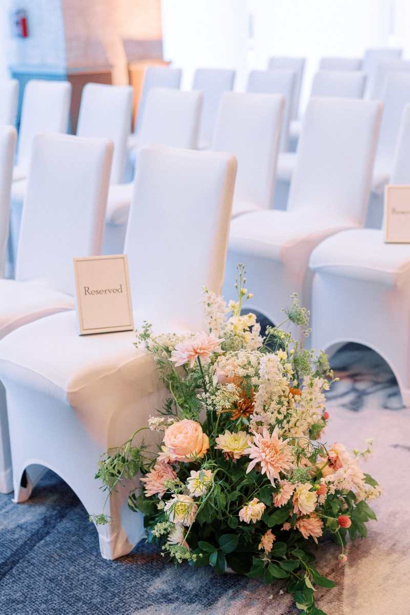 Wildflower ceremony aisle arrangement