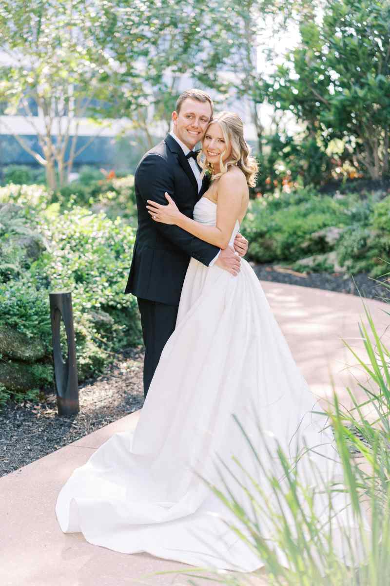 Bride and groom portraits around the WDW Swan Reserve
