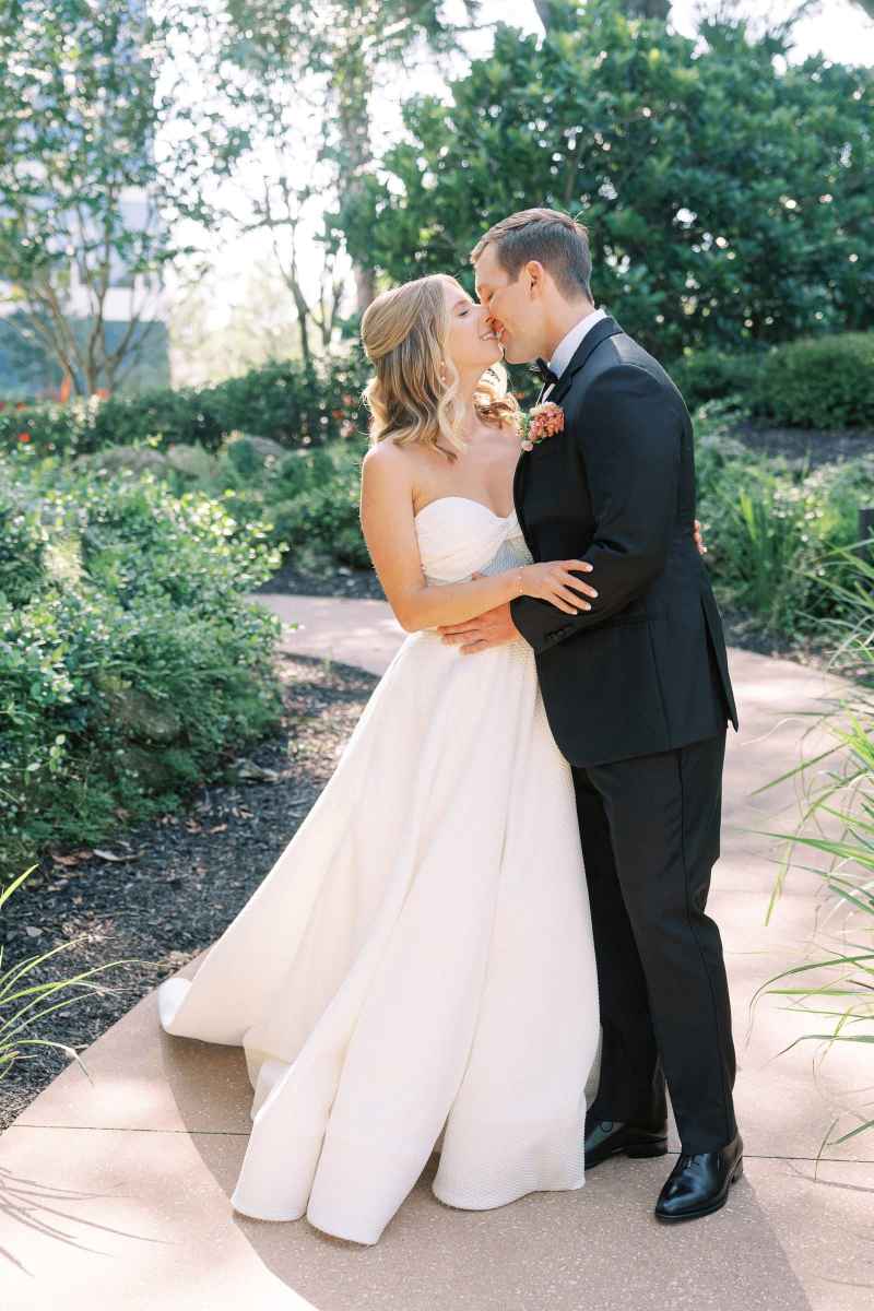 Bride and groom portraits around the WDW Swan Reserve