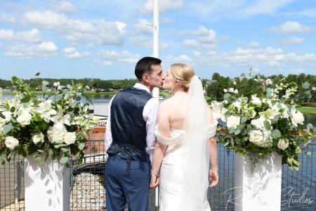 Post-ceremony wedding portraits at Paddlefish Disney Springs