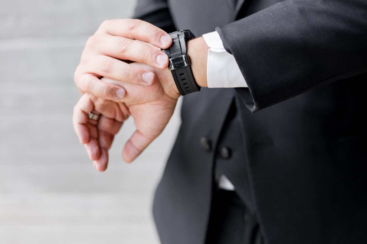 Groom checking his watch