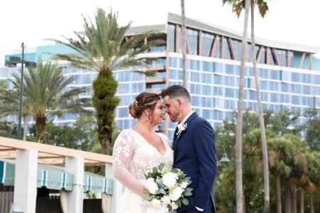 Bride and groom portraits around the WDW Swan Reserve and Disney's Boardwalk