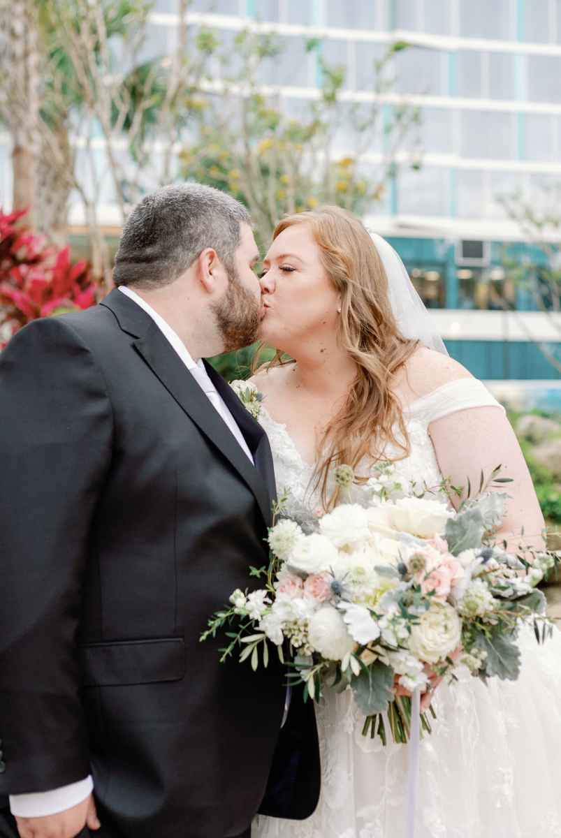 Bride and groom portraits at the WDW Swan Reserve