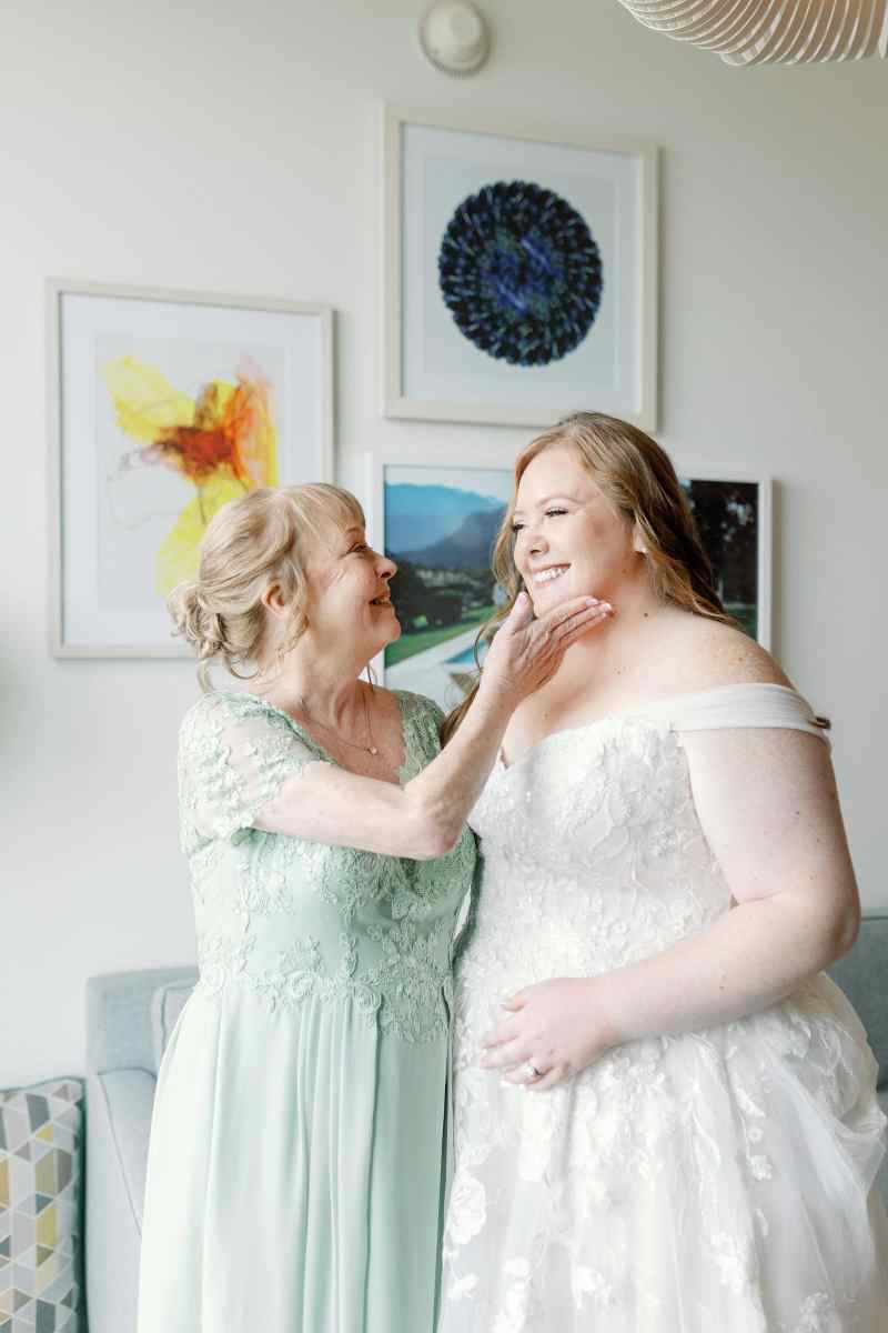 Bride getting ready moments with her mother