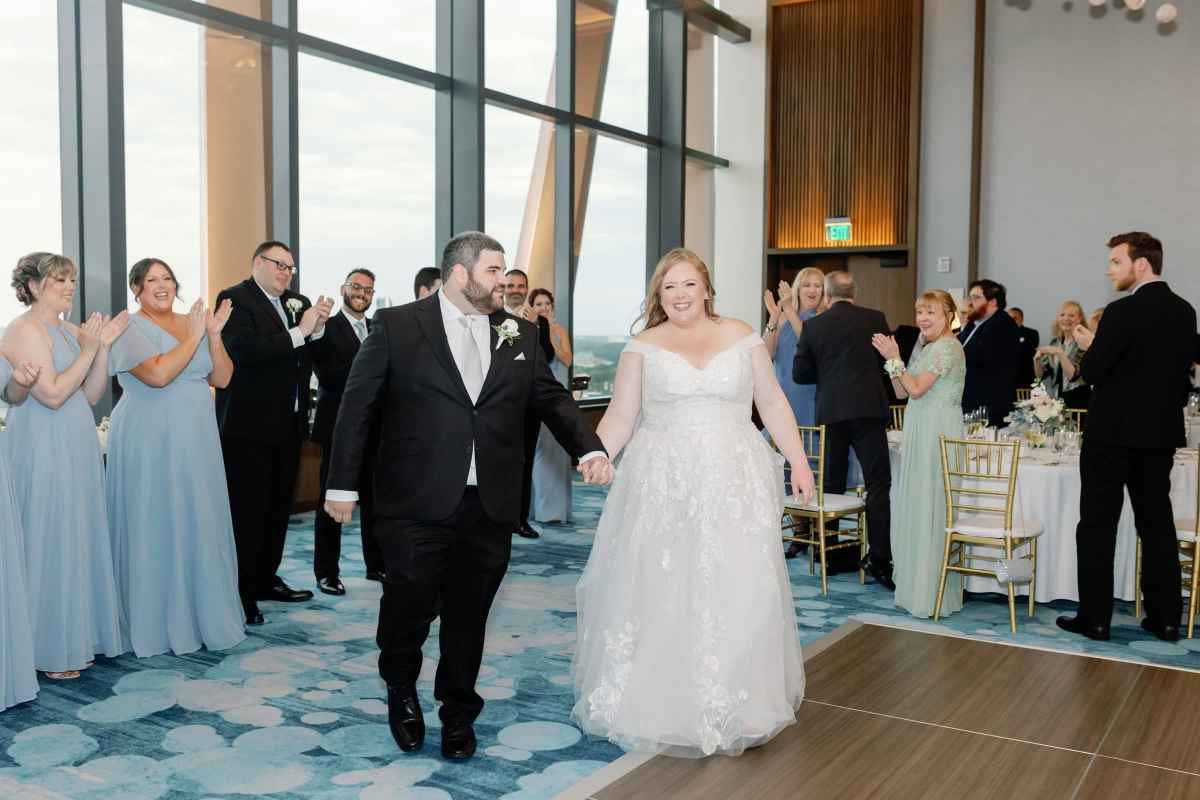 Bride and groom entering the dance floor for their first dance