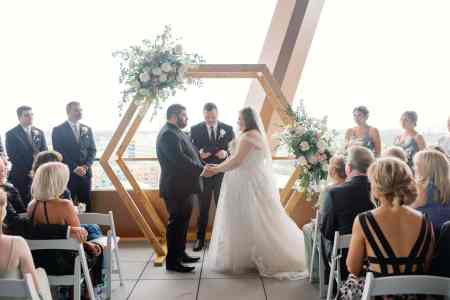 Balcony wedding on the WDW Swan Reserve's Vue Terrace