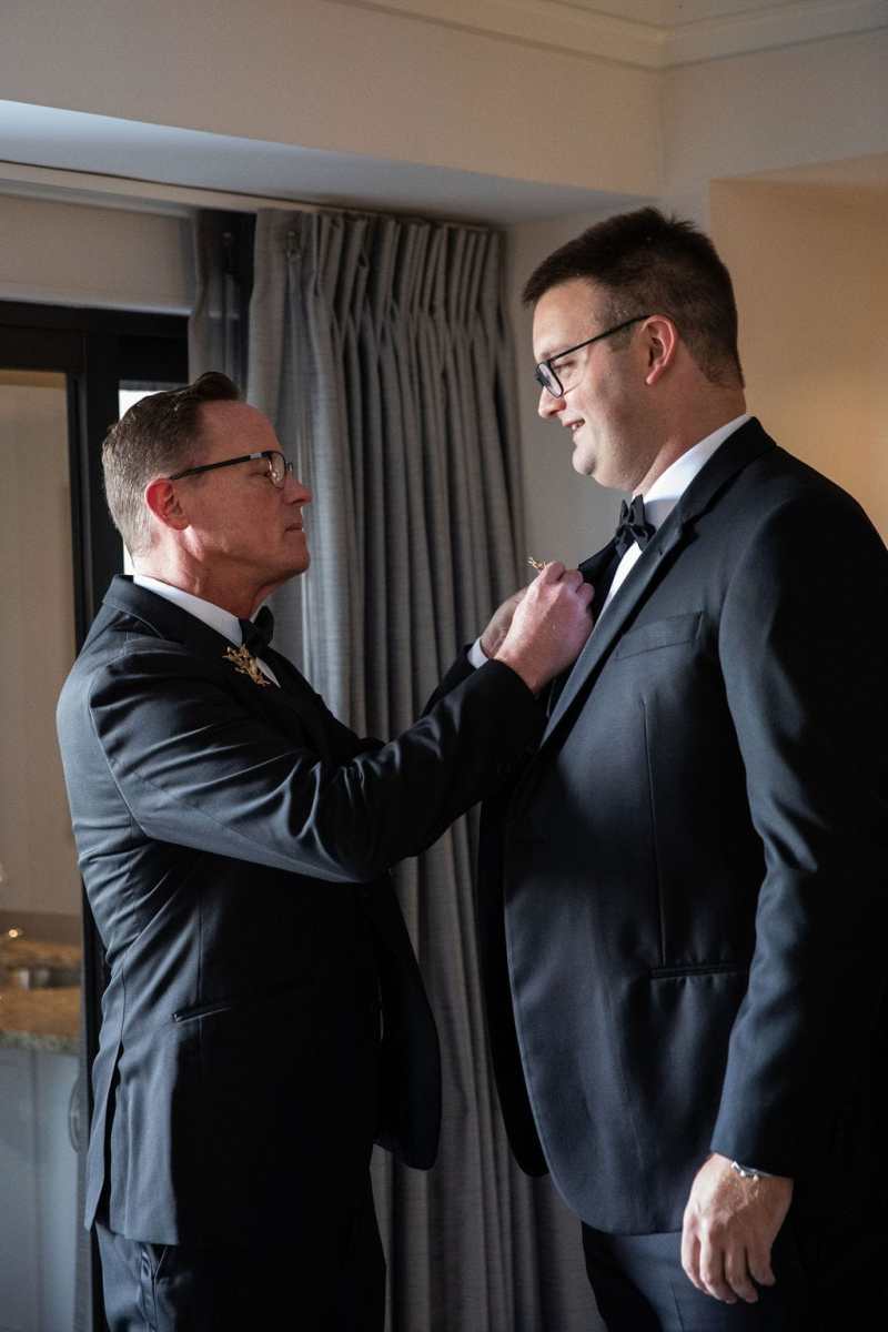 Groom getting ready with his father