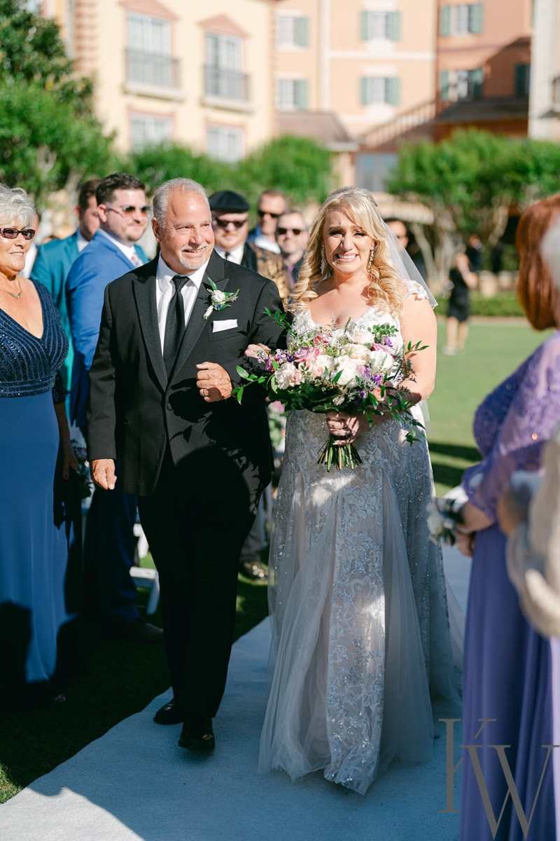 Bride processing up the aisle at the Portofino's Villa Piazza