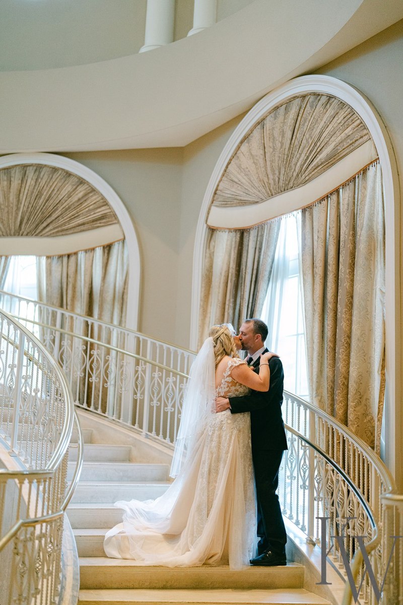 Bride and groom portraits around the Loews Portofino Bay Hotel