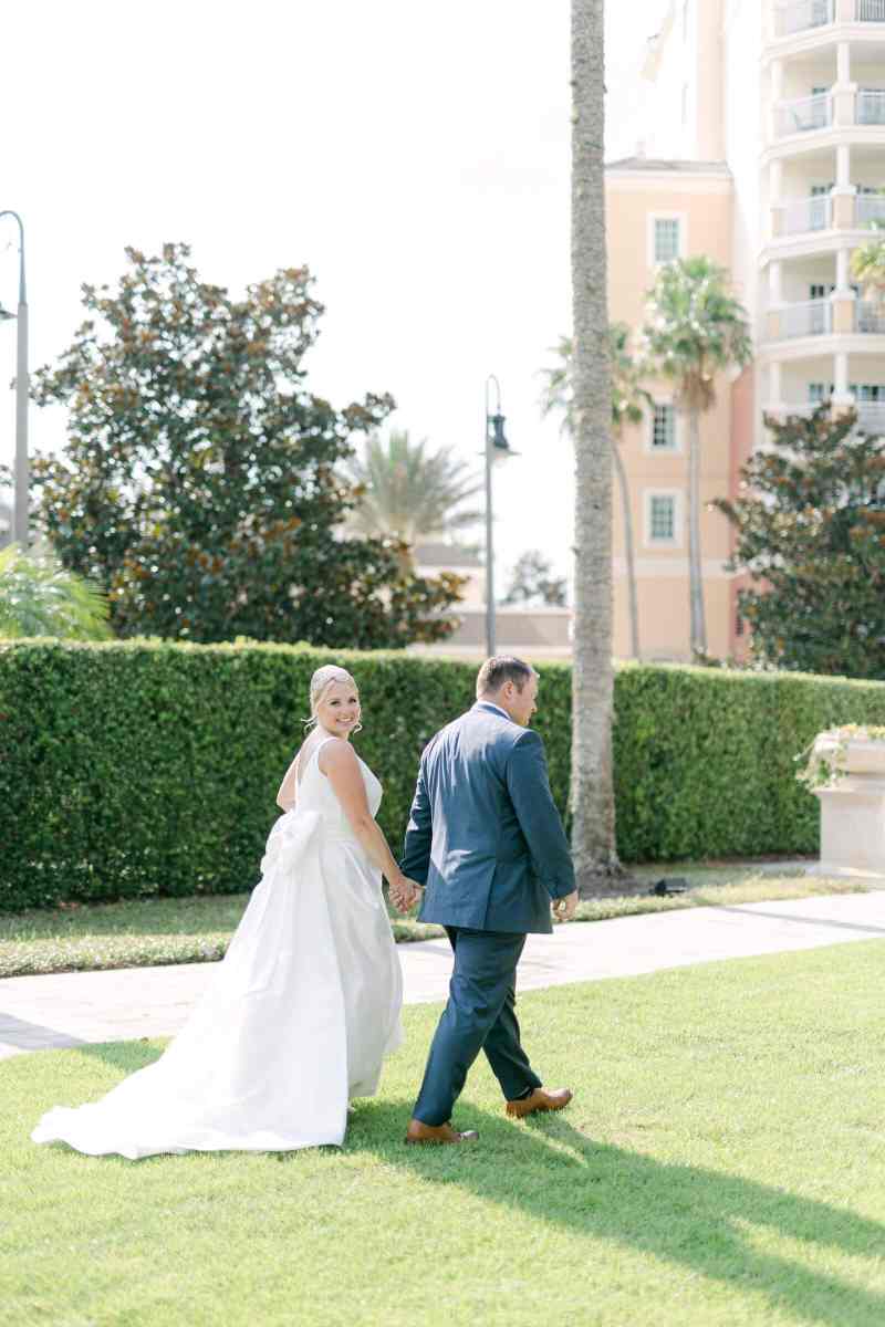 Bride and groom wedding portraits around Reunion Resort