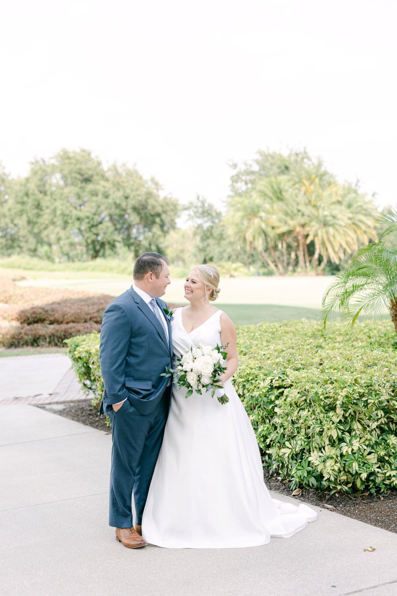 Bride and groom wedding portraits around Reunion Resort