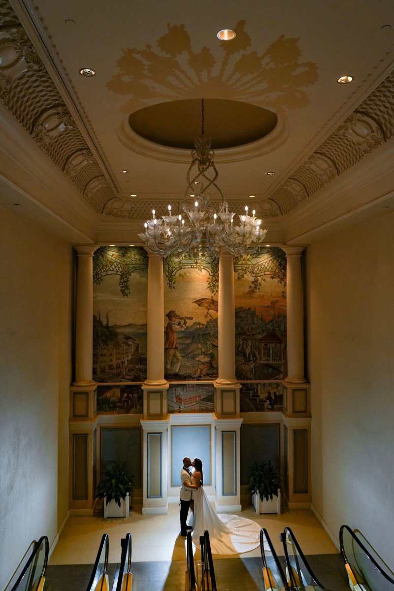 Bride and groom portraits around the Loews Portofino Bay Hotel