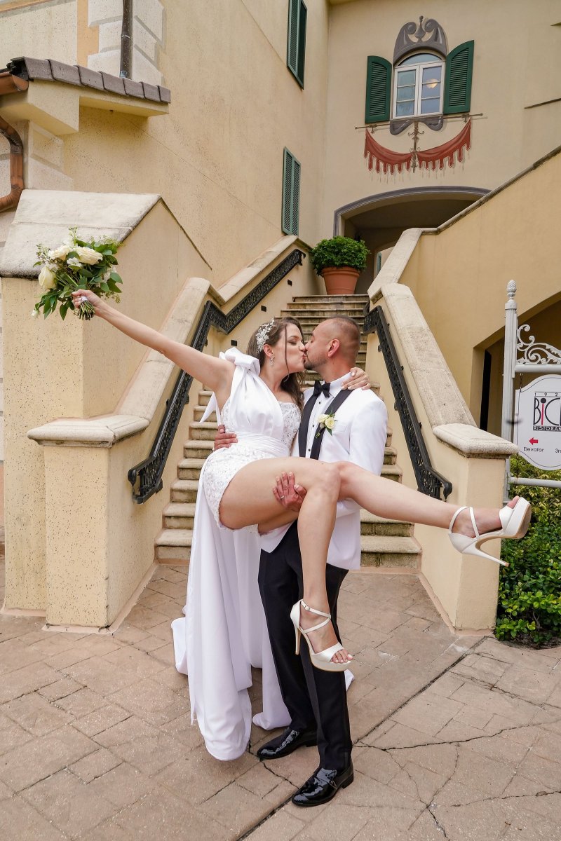 Bride and groom portraits around the Loews Portofino Bay Hotel