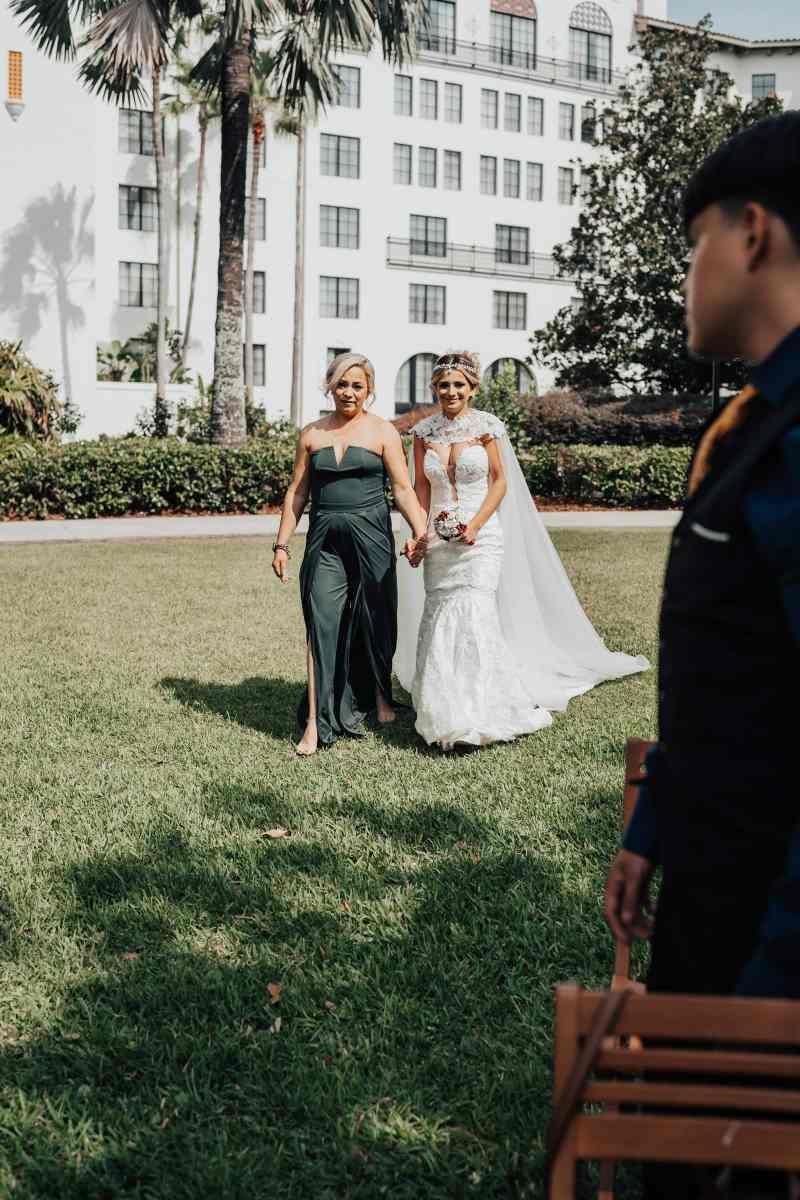 Bride processing with her mother
