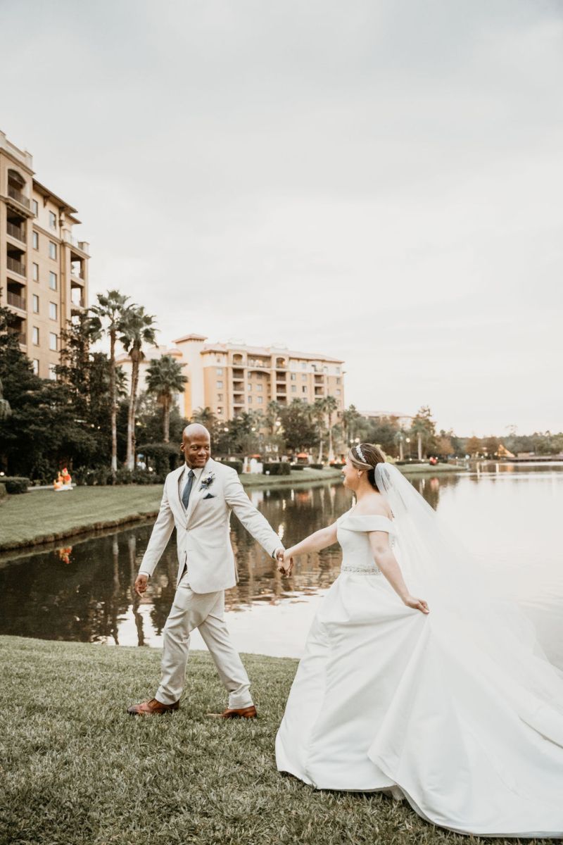 Bride and groom portraits around the Wyndham Grand Orlando Resort Bonnet Creek